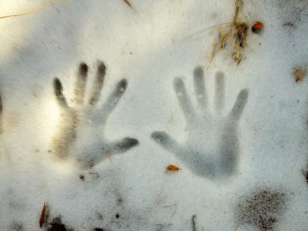 hands in snow